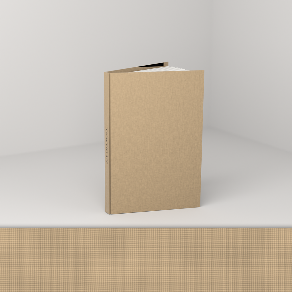 Tan linen edition [linen] — open, showing the cloth case and blank ruled pages