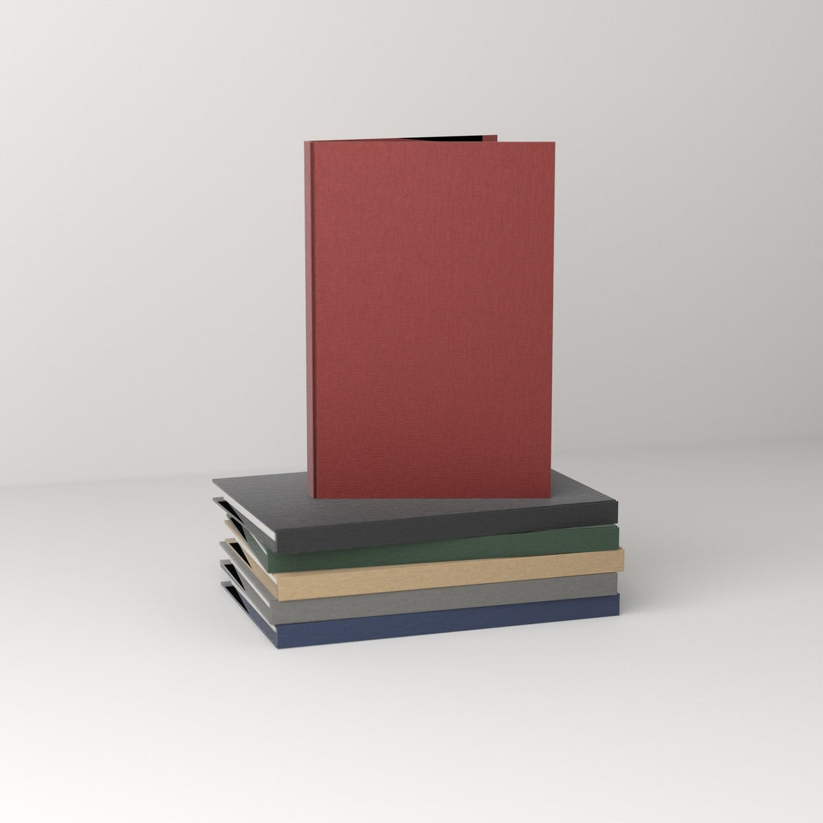 Linen hardcovers without their dust jackets